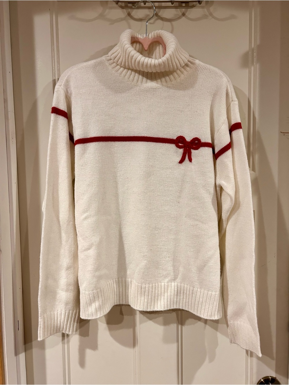 Vintage Cream Turtleneck Sweater with Red Bow Accent